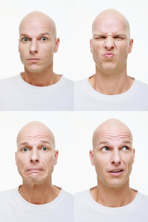 Man making a series of exaggerated faces for the cameraの写真素材