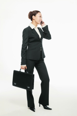 Businesswoman talking on the mobile phoneの写真素材