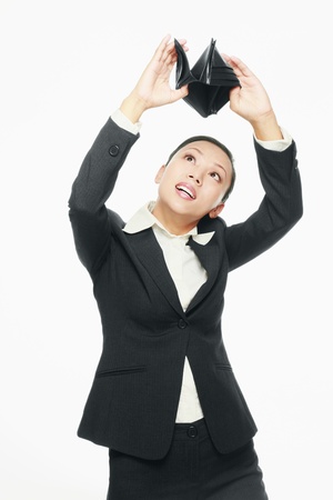 Businesswoman searching for money in wallet
