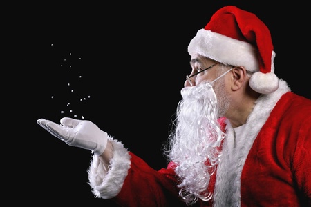 Santa claus playing with snowの写真素材