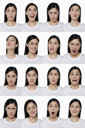 Montage of woman pulling different expressionsの写真素材