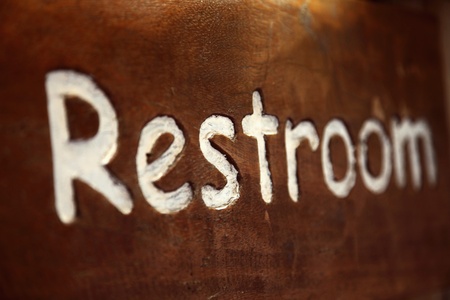 Restroom sign on a wallの写真素材