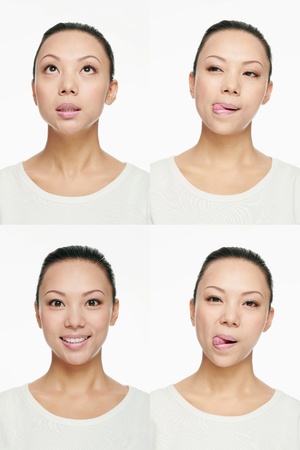 Montage of woman pulling different expressionsの写真素材