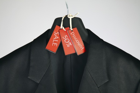 Suit on coathanger with sale tagの写真素材