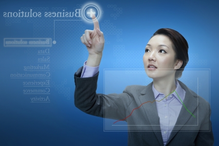 Businesswoman using digital screen の写真素材