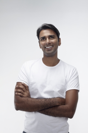 Man smiling with arms crossedの写真素材