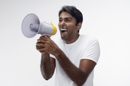 Man shouting through megaphoneの写真素材