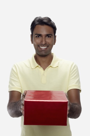 Man holding a gift boxの写真素材