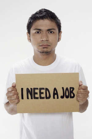 Man holding  I need a job  signの写真素材