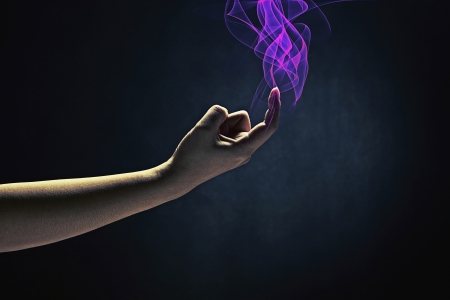 Human hand extending an invitationの写真素材