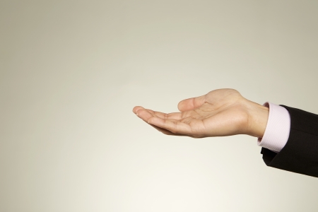 Person holding out his palmの写真素材
