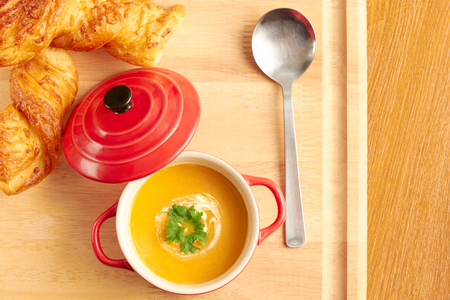 Pumpkin soup with pastryの写真素材