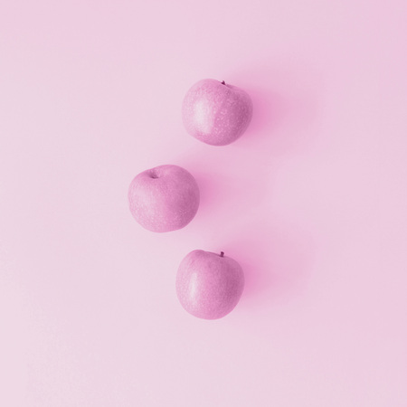Apples on pastel backgroundの写真素材
