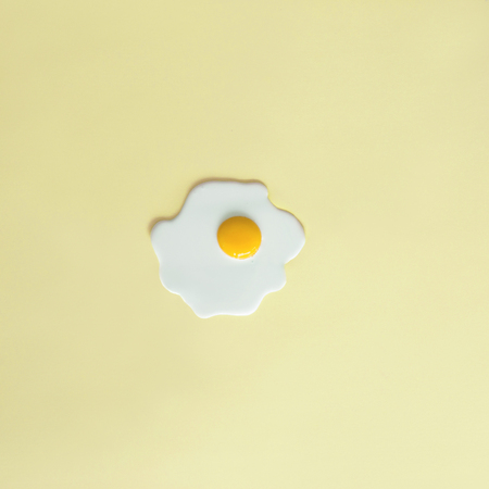 Sunny side up on pastel backgroundの写真素材