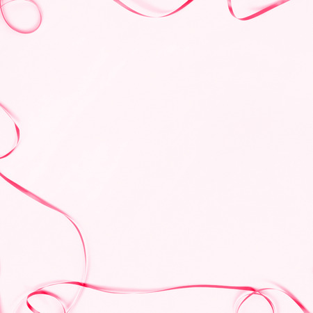 Pink ribbon on white backgroundの写真素材