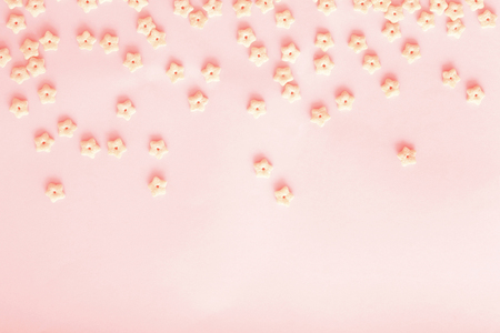 Cereal star shapes on pastel backgroundの写真素材