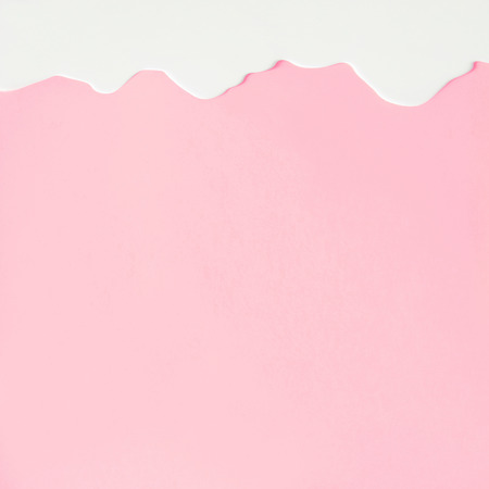 Liquid flowing down concept on pastel backgroundの写真素材
