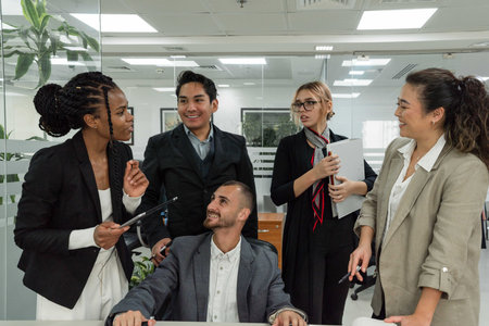 Young businesspeople smiling in the office