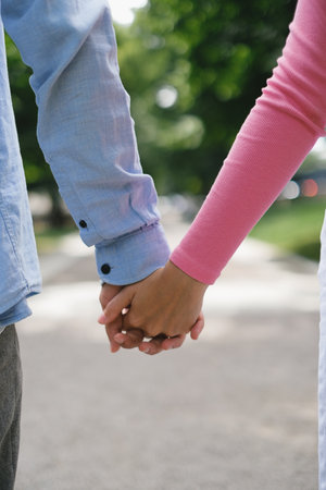 Young couple holding each other's hands
