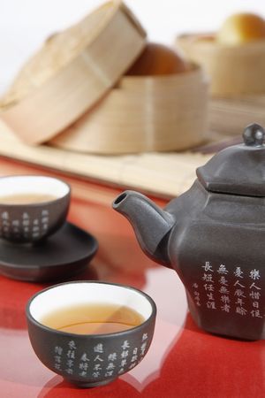 Chinese tea set with dim sumの写真素材