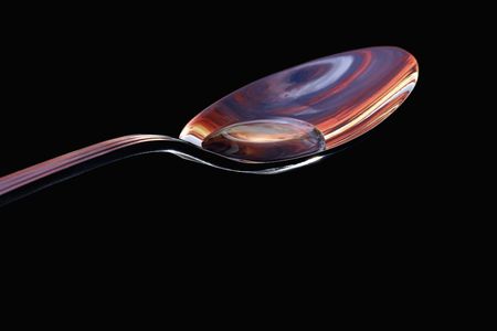 Water droplet on spoonの写真素材