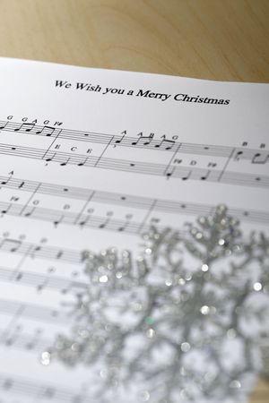 Christmas ornament on sheet musicの写真素材