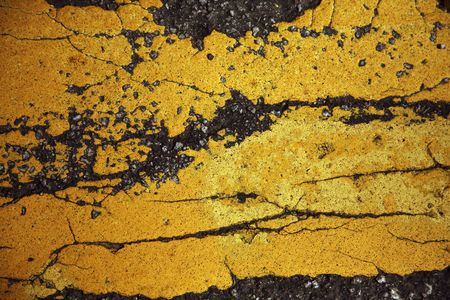 Cracks on painted roadの写真素材