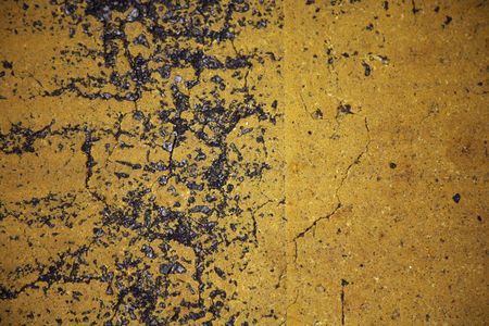 Cracks on painted roadの写真素材
