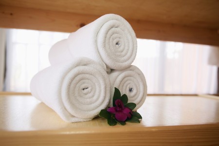 Fresh white towels rolled upの写真素材