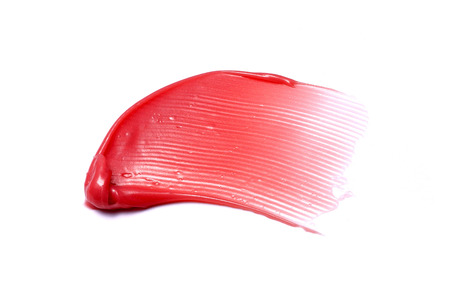 Lip gloss isolated on white