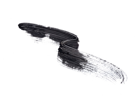 Black mascara smears isolated on whiteの写真素材