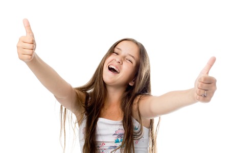 Portrait of positive smiling girl. Isolated on white.の写真素材