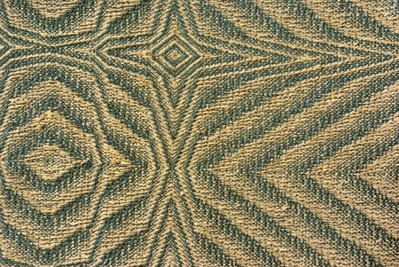 Fabric from flax. The beautiful sample of a fabric. A combination of strips and rhombuses.