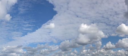 Clouds up to horizon. Light cyan color.