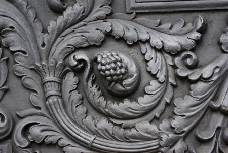Details of a gun carriage (of a bronze gun). A stalk, Leaves and fruits of a plant.の写真素材