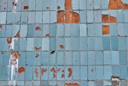 Highly damaged blue tile. Grunge background.の写真素材