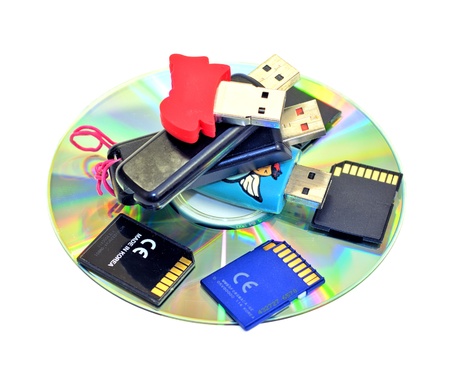 Small pile of USB Flash Drives, SD cards, CDROM