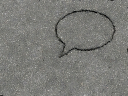 Asphalt - talk bubble from the cracks. Cool industrial elementの写真素材