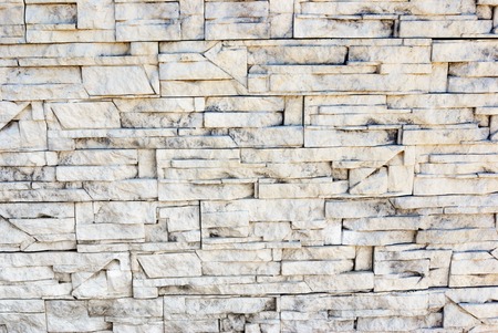 Recurrent stone masonry light bars.  Background texture.