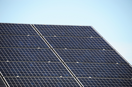 solar panel against blue skyの写真素材