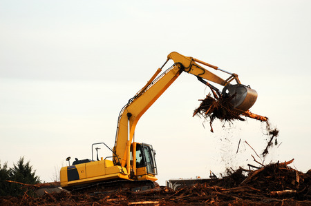 excavator in construction siteの写真素材
