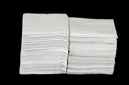 stack napkins isolated on black backgroundの写真素材