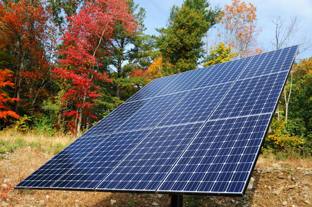 solar panel with colorful autumn trees