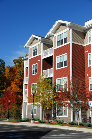 modern apartment building in sunny dayの写真素材