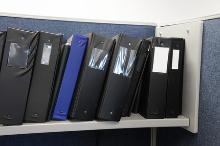 stacking document folder on the shelf