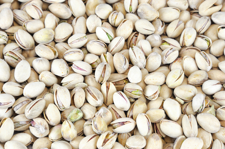 fresh roasted pistachio as food backgroundの写真素材