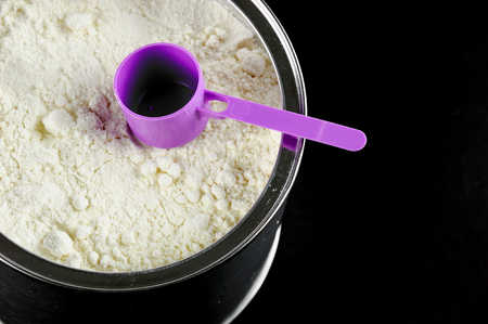 high angle view of baby formula and scoop in canの写真素材