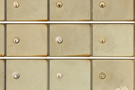 closeup on old mail box of communityの写真素材