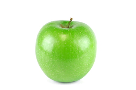 single green apple on white backgroundの写真素材