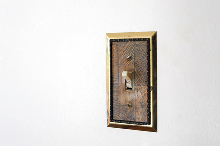 close up on old switch on the wallの写真素材